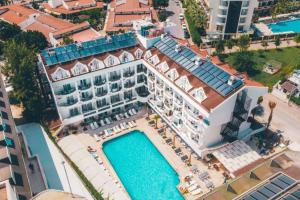 an aerial view of a hotel with a swimming pool at Elit Life Otel - All Inclusive in Kemer