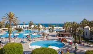 an overhead view of a resort with a large pool at El Mouradi Djerba Menzel - Couple et Famille uniquement in Midoun