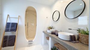 a bathroom with a sink and a mirror at LA Casa Di Lusso N7 -Adults Only in Kolymbia