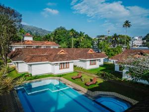 an aerial view of a house with a swimming pool at Silver Crest Resort in Thekkady