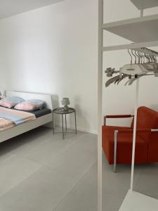 a bedroom with a bed and a table with a skeleton on the wall at Villa Una in Crikvenica +102 photos