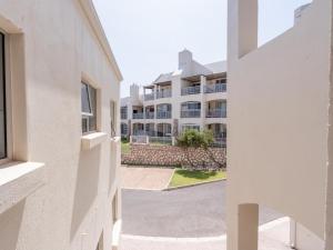 a view from the hallway of a building at Sunset Heights in Langebaan