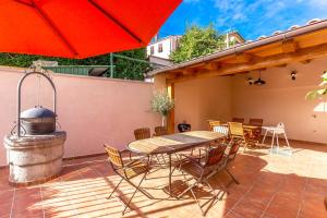Patio alebo iná vonkajšia časť ubytovania Il Palazzo