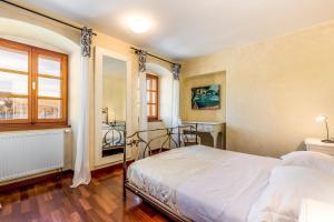Posteľ alebo postele v izbe v ubytovaní Il Palazzo