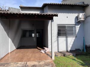 a front porch of a house with a patio at Casa jardim fonte nova in Goiânia