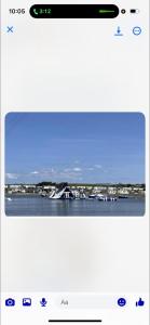 a screenshot of a phone screen with a view of the ocean at Trailer by the sea in Millom