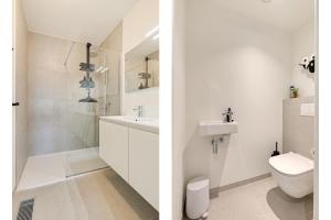 ein weißes Badezimmer mit Toilette und Waschbecken in der Unterkunft Flat Scarpato in Kortemark + 8 Fotos