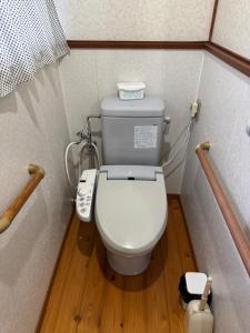 a bathroom with a toilet in a small room at ぺろんち in Shinkamigoto +16 photos