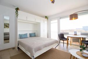 Llit o llits en una habitació de Atlantic 408 27 fotos més