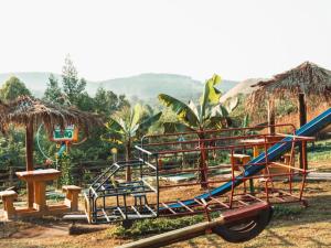 a park with a playground with a slide at Beach Island Graskop in Graskop
