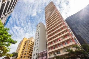 a group of tall buildings in a city at Galeria Tijucas in Curitiba