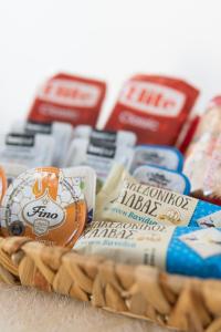 a basket filled with different types of food at Aioliana Apartments in Mytilene