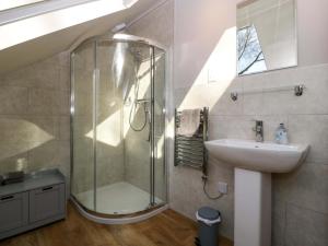 a bathroom with a shower and a sink at Broadmoor Chapel in Hereford +19 photos