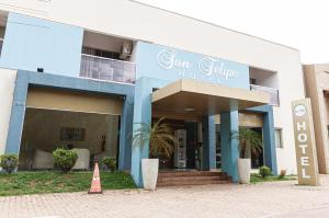 a building with a sign on the front of it at San Felipe Hotel in Colinas do Tocantins