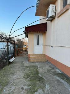a building with a white door and a window at DekaHome4you in Marten
