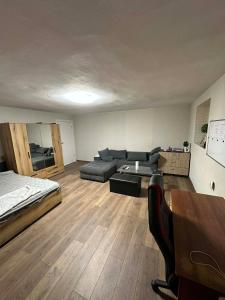 a large living room with a couch and a table at DekaHome4you in Marten