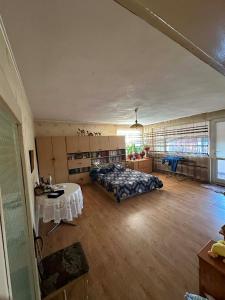 a large room with two beds and a table at DekaHome4you in Marten