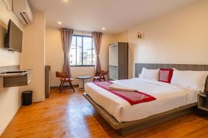 a bedroom with a large bed in a room at The Resident Kathmandu in Kathmandu