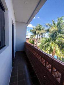a balcony with a view of the ocean at GuestHouse Encanto del Centro 3 in Encarnación