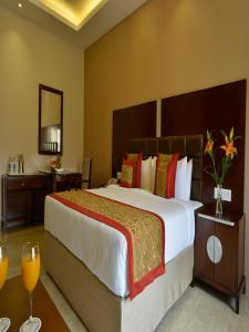 Orchha Palace and Convention Centre客房内的一张或多张床位