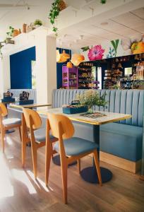 a dining room with a table and chairs at Hotel Le Provence - Restaurant Le Styx in La Palud-sur-Verdon