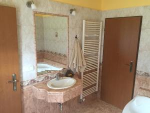 Koupelna v ubytování Rekreační dům u Marušky