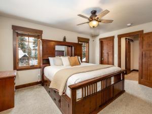 a bedroom with a bed and a ceiling fan at Family Home, Hot Tub, Suncadia Pool Access in Cle Elum +29 photos