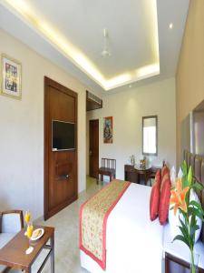 Orchha Palace and Convention Centre的电视和/或娱乐中心