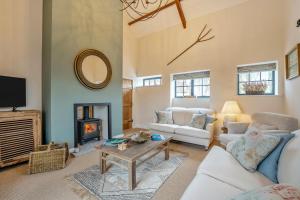 a living room with a white couch and a fireplace at 3 Bed in Sedgehill oc-b34698 in Sedghill