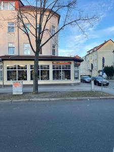 a building on the side of a street at Kulinarische Zauberei in Rathenow