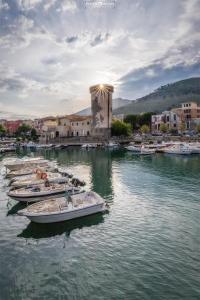 a group of boats docked in a harbor at Il Nido di Chiara 2 in Formia