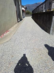 a shadow of a fire hydrant at villetta a schiera in Intra