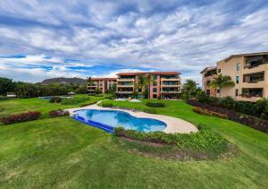 an aerial view of an apartment complex with a swimming pool at Punta Mita 4BR Paradise Golf Course Views in Punta Mita