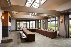 a conference room with tables and chairs and windows at Waldorf Astoria Monarch Beach Resort & Club in Dana Point +104 photos