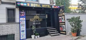 a royal hotel with a bench in front of it at İstanbul Royal Hotel Kumkapı in Istanbul