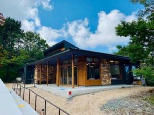 a small house with a blue roof at scene - Vacation STAY 52631v in Daisen
