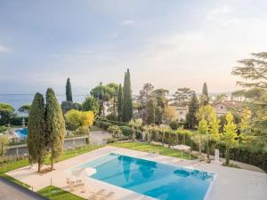 an aerial view of a swimming pool in a villa at Baldo View Studio in Toscolano Maderno