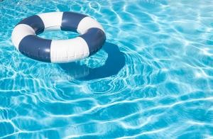 an inflatable swim ring in a swimming pool at La Ronde Three - Unit 3 - Oceanstays in Yamba