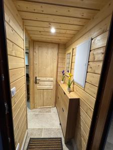 a small room with a wooden wall at Studio PRINTEMPS in Sens