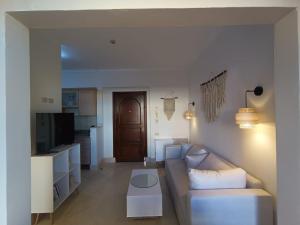a living room with a couch and a table at OrientalCoast in Quseir