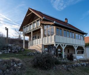 a large house with a gambrel roof at Lagom Vendégház in Zalaszentgrót
