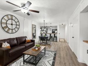 a living room with a couch and a table at Turkey Nest by Beyond Expectations Renovated 2BR in Gatlinburg