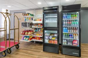 a store with an open refrigerator filled with drinks at Spark By Hilton Roanoke Airport in Roanoke