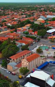 an aerial view of a city with buildings at Casa Jo Fortim in Fortim