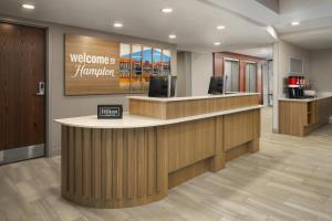 a welcome manager counter in a hospital lobby at Hampton Inn - York in York