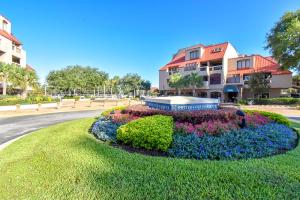 a circle of flowers in front of a building at 7169 Harbourside II in Hilton Head Island
