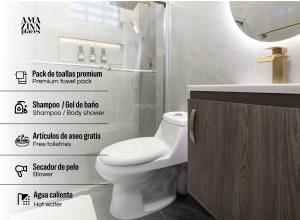 a bathroom with a white toilet and a sink at Ph Costa Grande n6 in Nueva Gorgona +24 photos