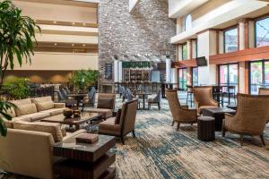 a lobby of a hotel with couches and chairs at DoubleTree by Hilton Sonoma Wine Country in Rohnert Park