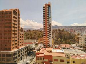 a view of a city with tall buildings at Departamento de lujo 2D Av Arce in La Paz