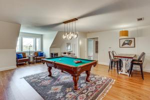 a living room with a pool table in it at Spacious Getaway By Wolf Pen Gap 15 Acres and Pool! in Mena